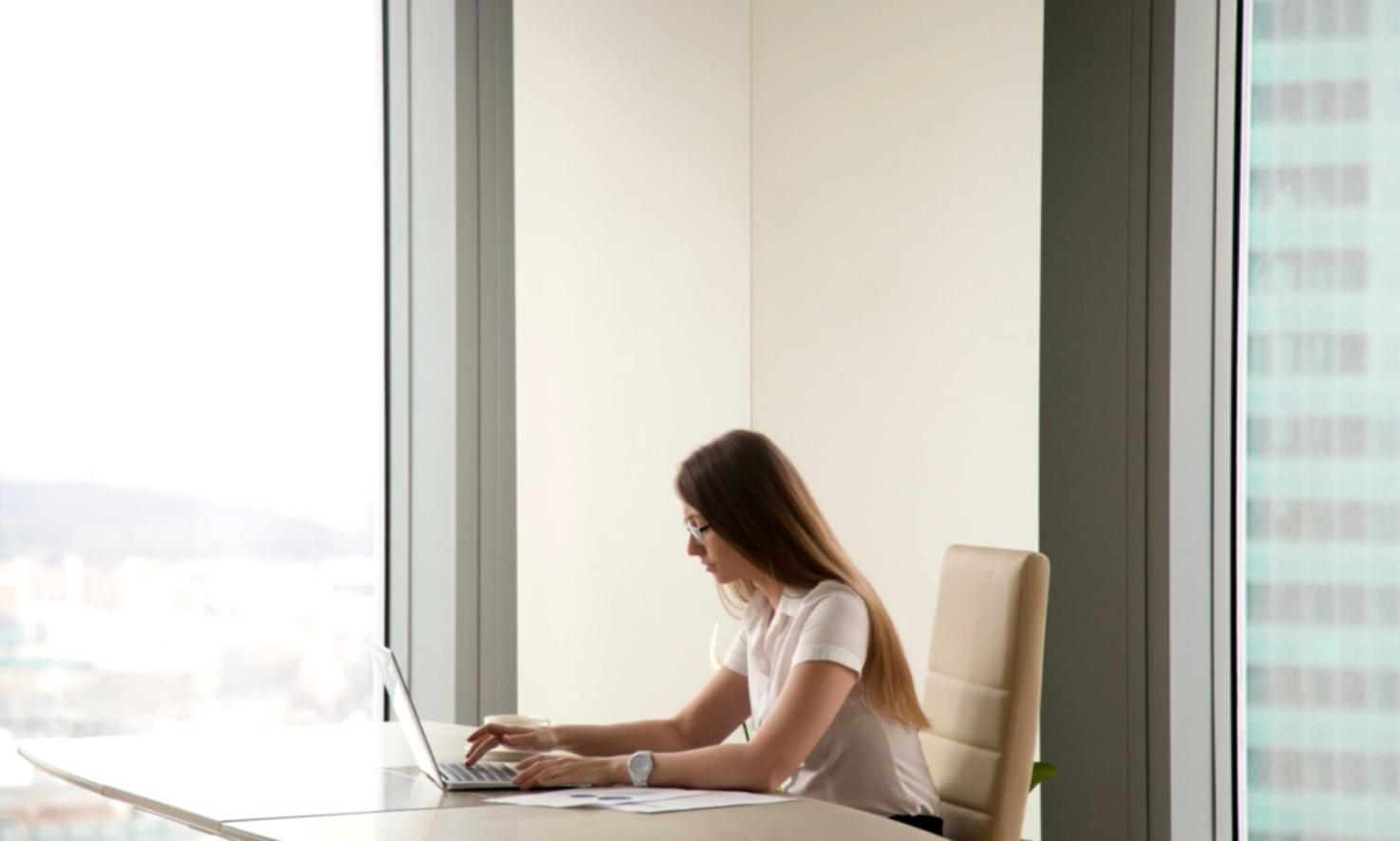 Network administrator working with server equipment and monitoring systems